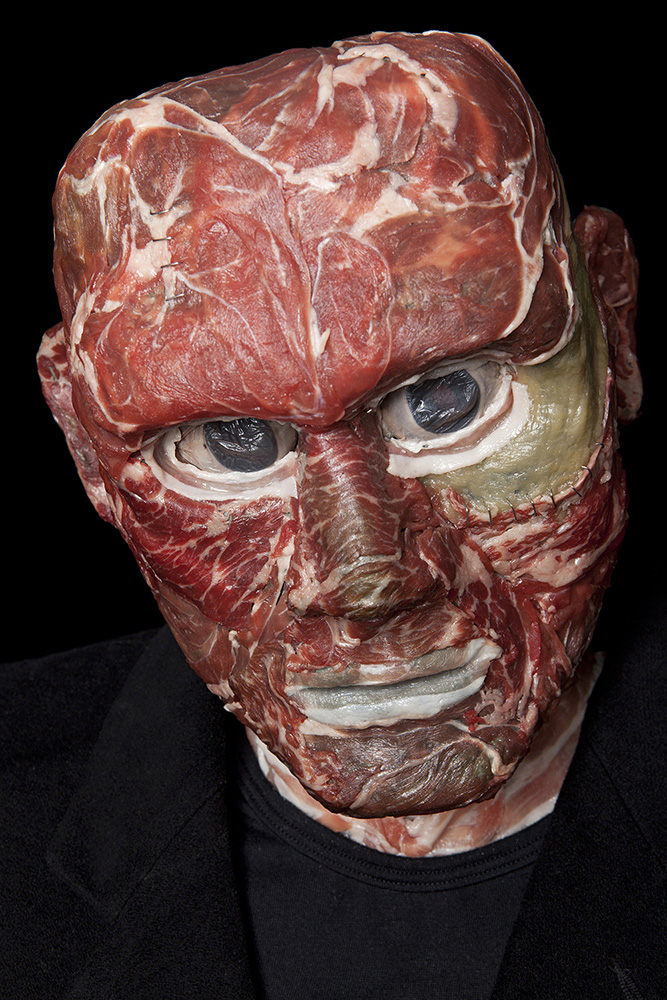 Sculptor crafts odd busts from organic refuse...