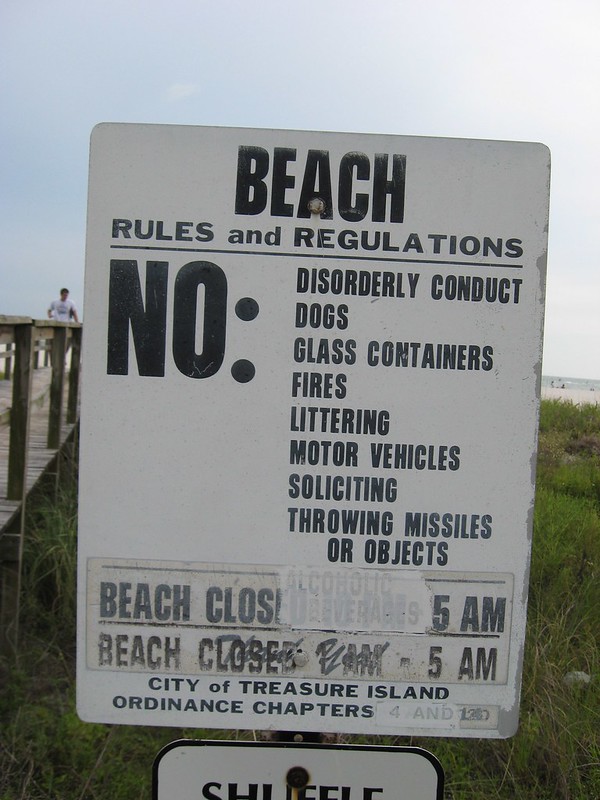 Sandy Clauses: 10 Bonkers Beach Rules Signs
